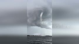 Florida boaters in shock as twin waterspouts form nearby
