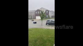 US: Car Navigates Flooded Streets in Lexington, KY