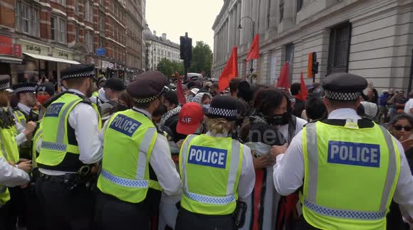 Football Lads' demo sees clashes between counter-protesters and police in London