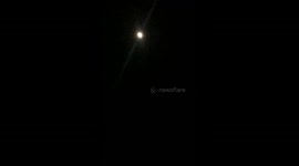 View of a shiny moon in the night sky, shocking and truth about how solar systems and energy works