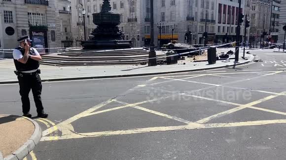 Piccadilly Circus in London closed off as forensics investigate a car crash