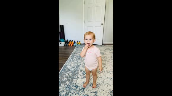 Two-year-old girl attempts to copy mum's workout in adorable video