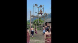 Swinging toward the sacred: Teen girls take part in Bali’s Ayunan Jantra ritual