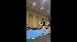Martial arts master smashes 12 wooden slabs with impressive spinning kicks