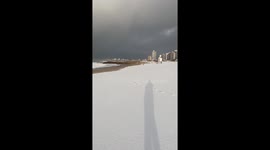 Snow falls along seaside beach in Miramar, Buenos Aires, Argentina