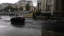 Thunder and Lightning hits London as a huge storms rains down hard on the capital