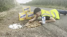 UK man campaigning to fix potholes eats Weetabix out of one