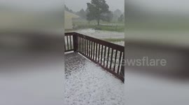 US: Hail Turns Colorado Porch Into A Scene Of Winter Beauty