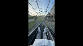 This train station has an awesome slide for passengers to exit