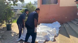 Relatives bid farewell to 10 Palestinians killed in Israeli strike on southern Gaza