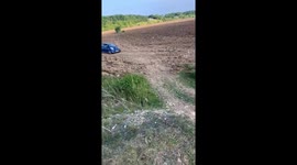 Citroën C1 jumps on muddy private land in Doncaster, England, UK