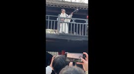 A Girl Plays the Sanxian