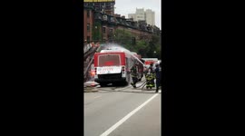 Boston firefighters put out bus fire