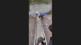 Dog Slips into Fishing Boat Chute