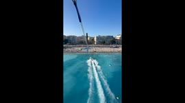 From sky-high to splash zone: Parasailing bros take a dive in the Riviera