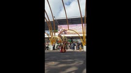 Woman collapses under costume during Banyuwangi Ethno Carnival in Indonesia