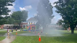 Veteran Event Fire Truck Spraying the crowd to cool Them.