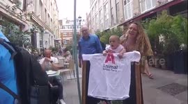 Animal welfair party leader poses with her kid