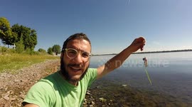 YouTuber catches large fish from lake WITH DRONE!