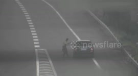 Man stops cars on motorway to ask for money
