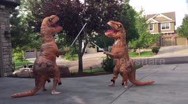 T-Rex light saber battle!