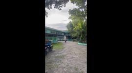 Impressive moment petite rider effortlessly manoeuvers off-road motorcycle