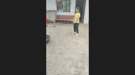 Girl Wobbles While Balancing on Basin Rim