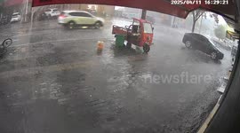 The Street Was Instantly Flooded by a Torrential Downpour