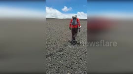 Geologists use snow shoes to cross Kilauea volcano after eruption