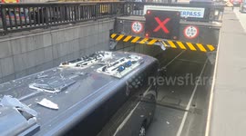 Coach snags roof on underpass near Waterloo Bridge, emergency services called