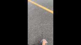 Satisfying footage of a parking lot drain being unblocked