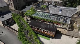 Train fan living in railway station turns vintage carriage into Airbnb