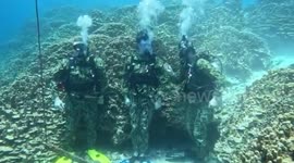 US: Marine Honored Underwater At Naval Base Guam On Independence Day
