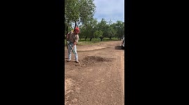 Rodent bursts out of burrow after Varmitgetter blast in San Diego, California, USA