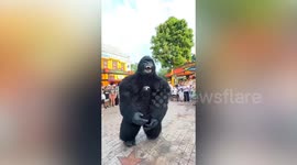 Awesome mascots dance with visitors at Thai theme park