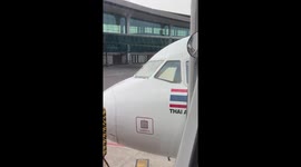 Passengers shocked to see plane with broken nose and windscreen