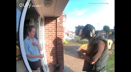 Homeowner takes photo of delivery driver posing with 'dream car'