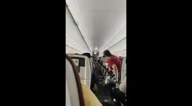 Passenger scolded by flight crew for rushing out of seat while plane was still moving