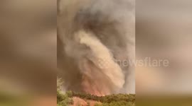 Huge fire tornado swirls through field as wildfires continue in northern Turkey