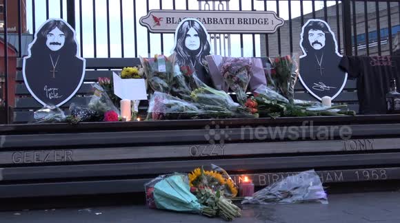 Fans pay their respects at Shrine for Ozzy Osbourne on Black Sabbath Bridge in Birmingham, UK