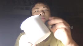 Swallowing and Spitting Out an Iron Ball Performance