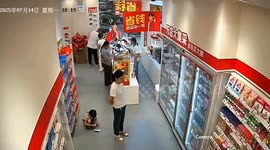 Collapsing supermarket shelf lands on young boy and sends woman face-first into fridge