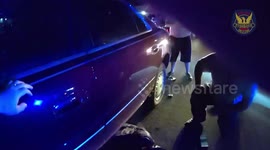 US: Police And Firefighters Lift Car To Rescue Trapped Motorcyclist In Phoenix