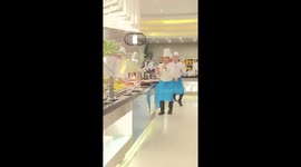 Singing and dancing chefs entertain tourists in the Philippines