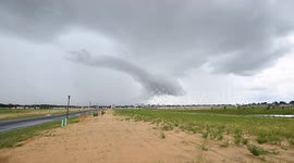 US: Dark, heavy clouds over homes in the Haines City area