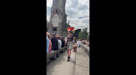 Scarlet and Buff-necked Ibis spotted with trainer at park in Brugelette, Belgium