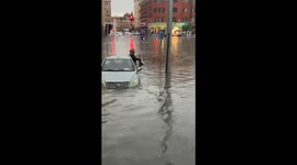 Motobike Driver Shows Skills in Flood