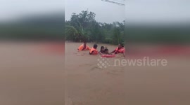 Philippines: Rescuers Save Two Kids From Deep Water Caught On Dramatic Video During Typhoon Emong