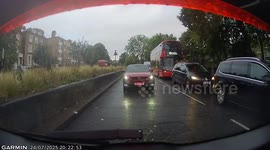 Mopeds filtering through traffic before jumping red lights.