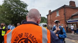 The organiser of the Stand Up To Racism march in Epping gets annoyed by live broadcasters at the scene,